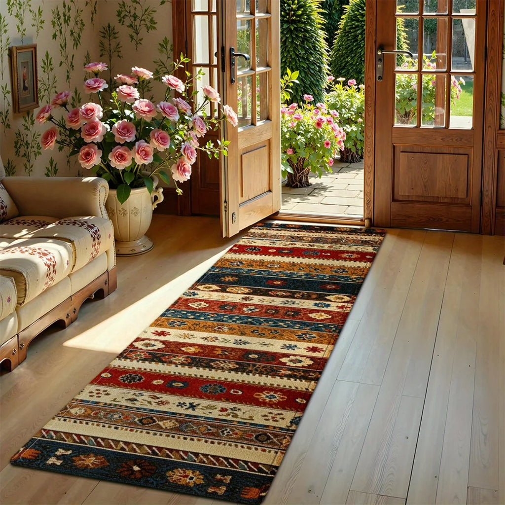 Entryway with a multicolored boho runner rug and floral accents