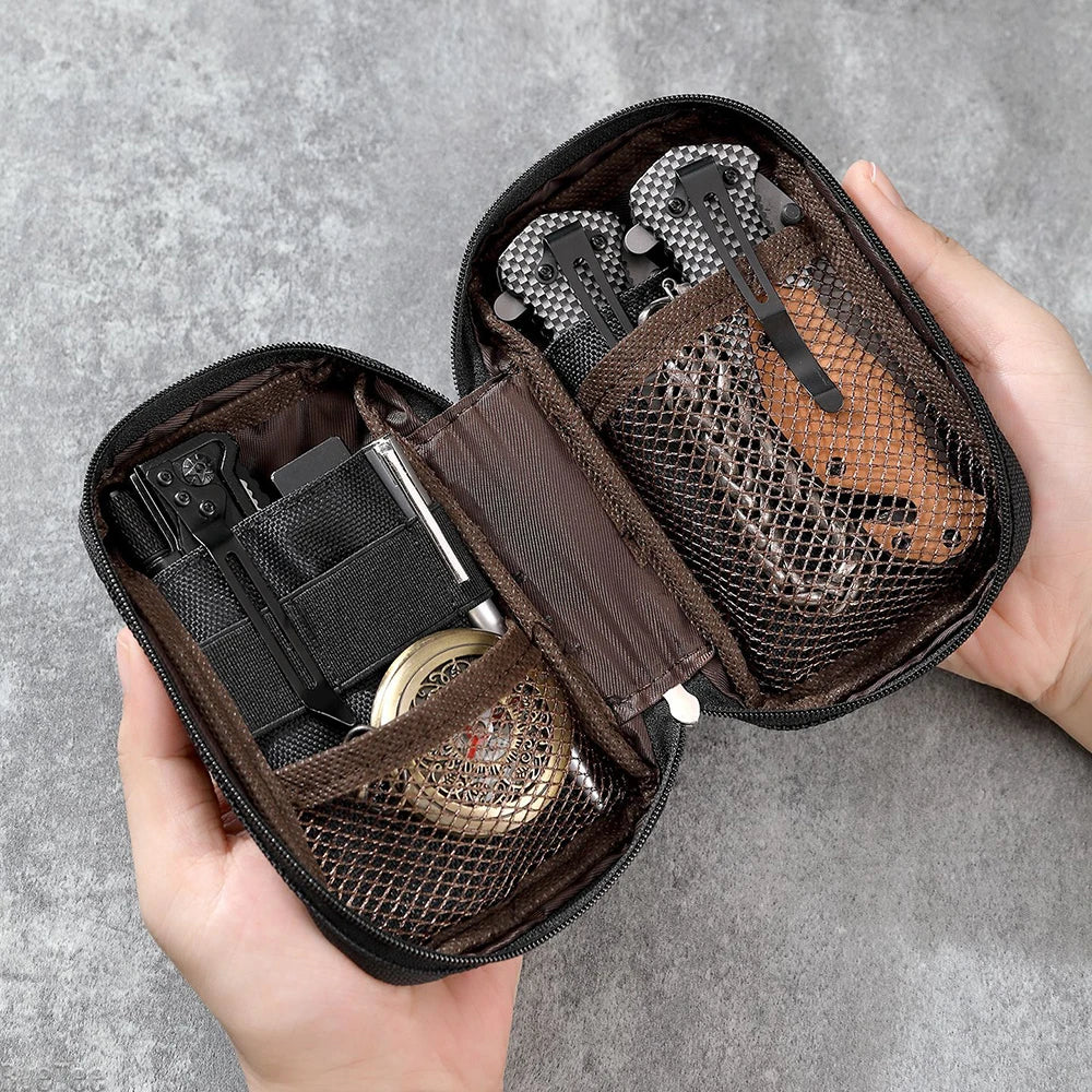 Open utility organizer pouch showing multitools, pocket gadgets, and mesh compartments.