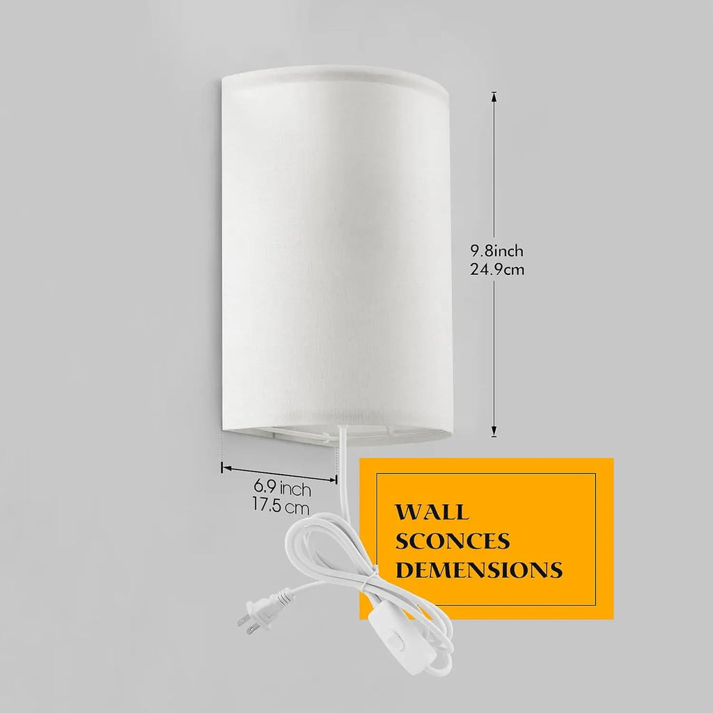 White wall sconce lamp with dimensions 9.8 inches high by 6.9 inches wide shown