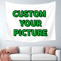 Custom photo wall tapestry mockup hanging above a living room sofa