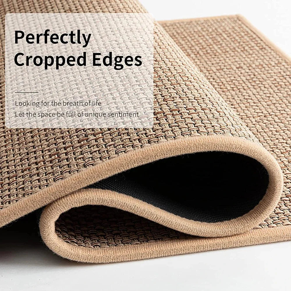 Close-up view of the perfectly finished edges and woven texture of the faux sisal rug