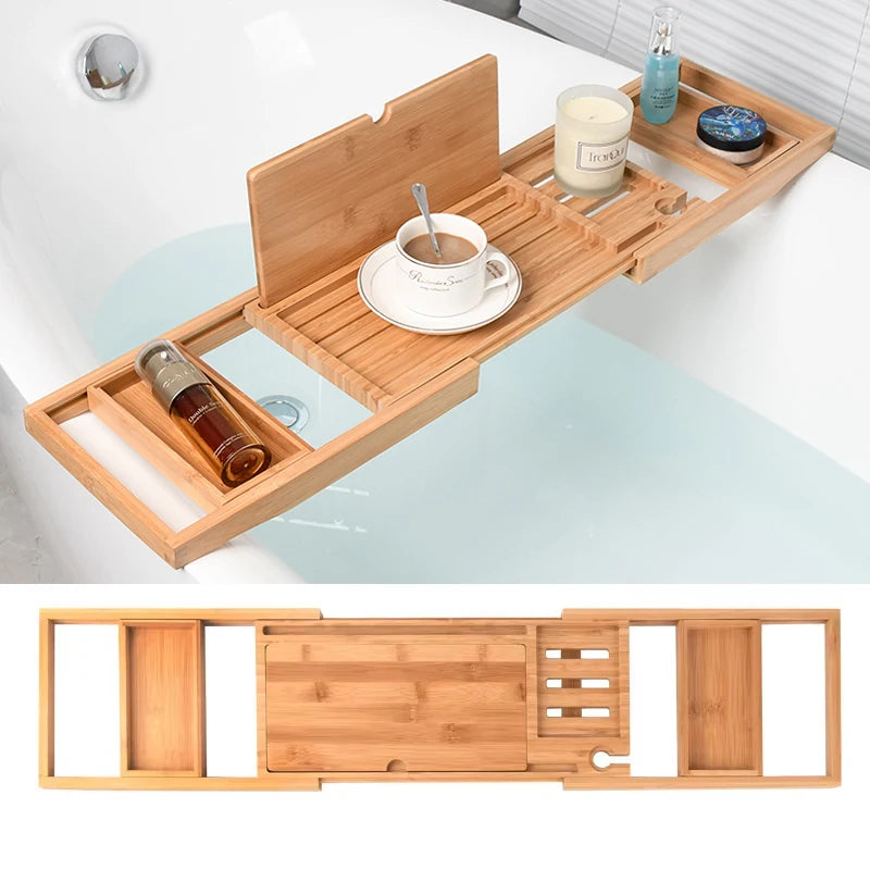 Expandable wooden bathtub tray in use holding cup, candle, bottle, and bath items