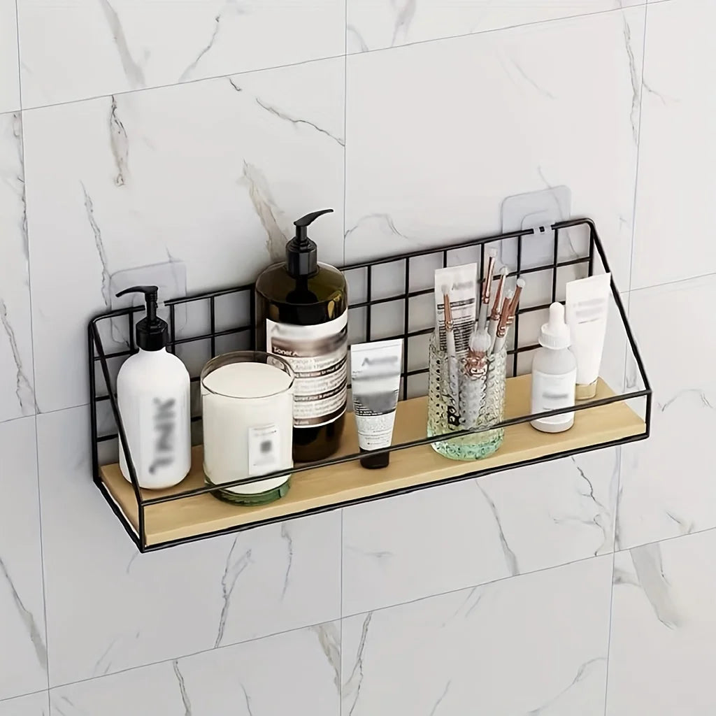 Wall-mounted wood and metal shelf on marble tile wall holding toiletries and containers