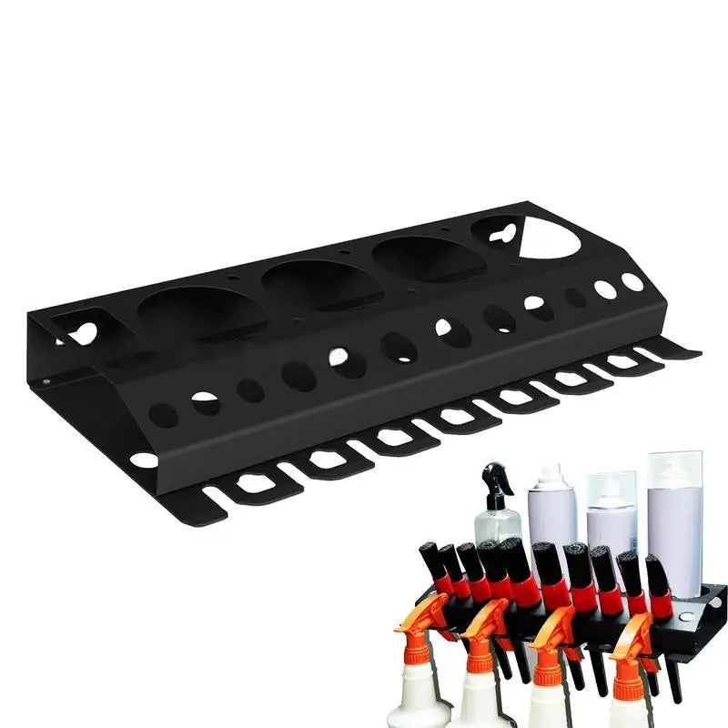 black metal spray bottle and cleaning brush organizer rack on white background with bottles and brushes in use