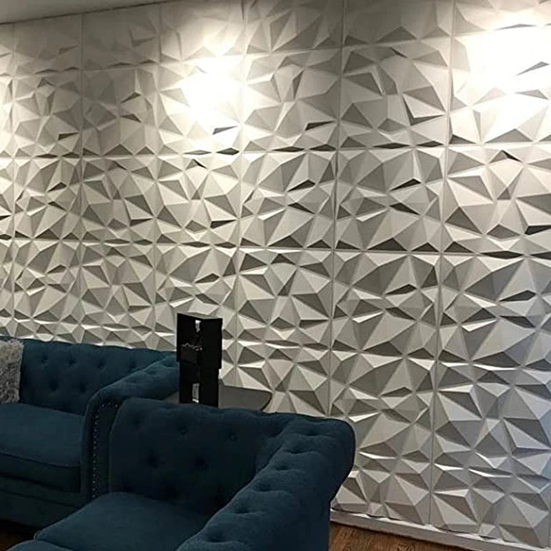 Living room accent wall covered with white 3D geometric panels