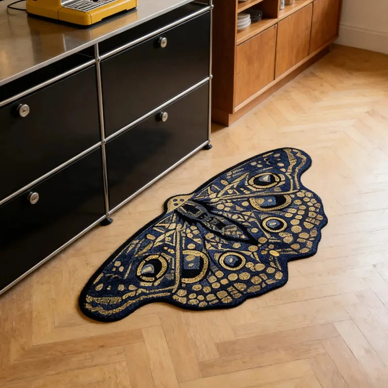 navy blue and gold butterfly shaped rug beside a modern kitchen cupboard