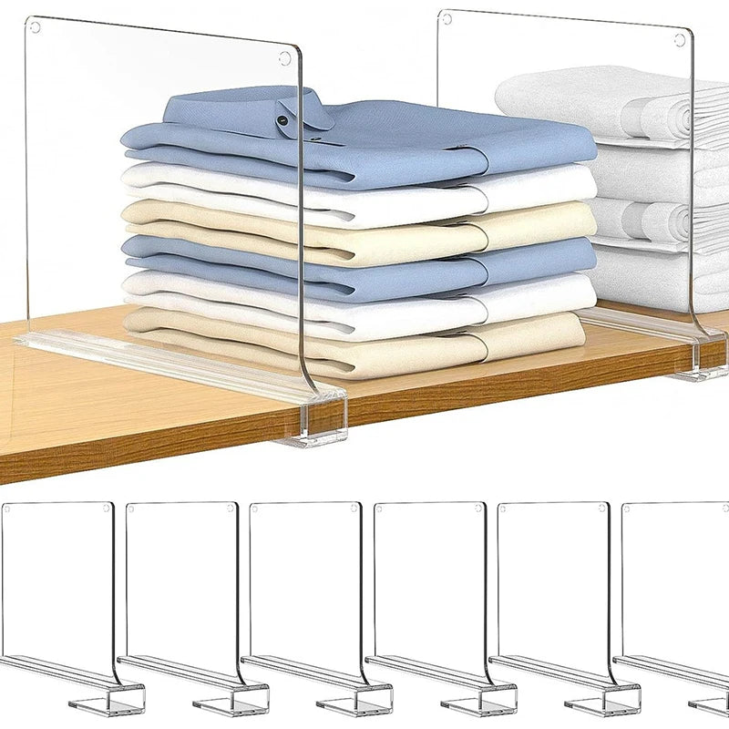 Clear plastic shelf dividers separating stacks of folded clothes on a wooden closet shelf