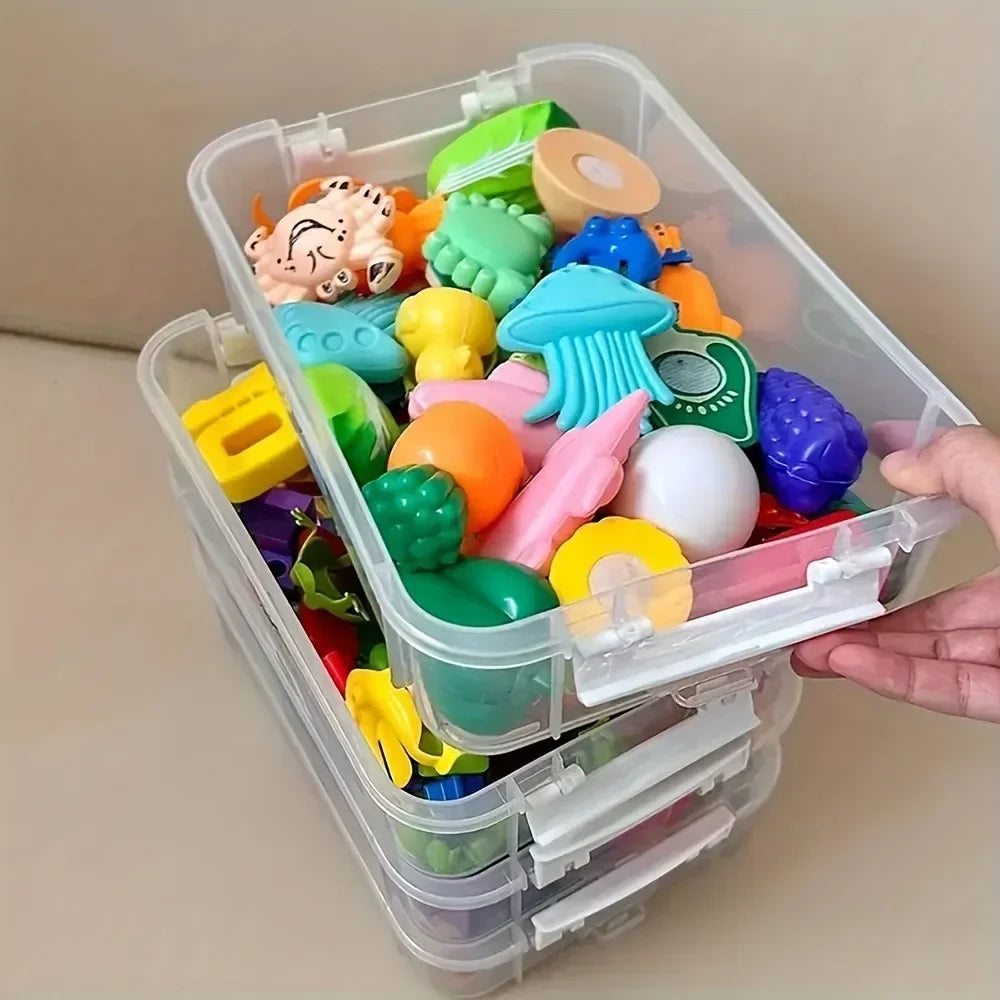 Three-tier stackable storage box filled with colorful kids' toys and game pieces