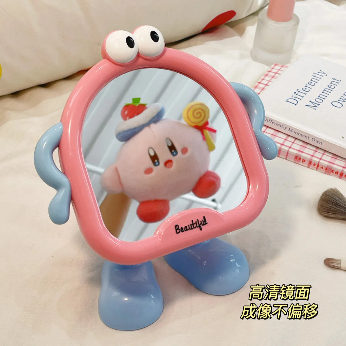 pink cartoon desktop mirror reflecting a plush toy on a cozy bed