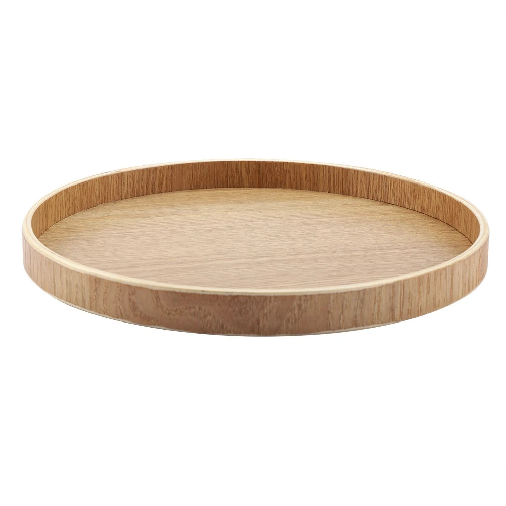 Side view of round wooden tray showing raised rim