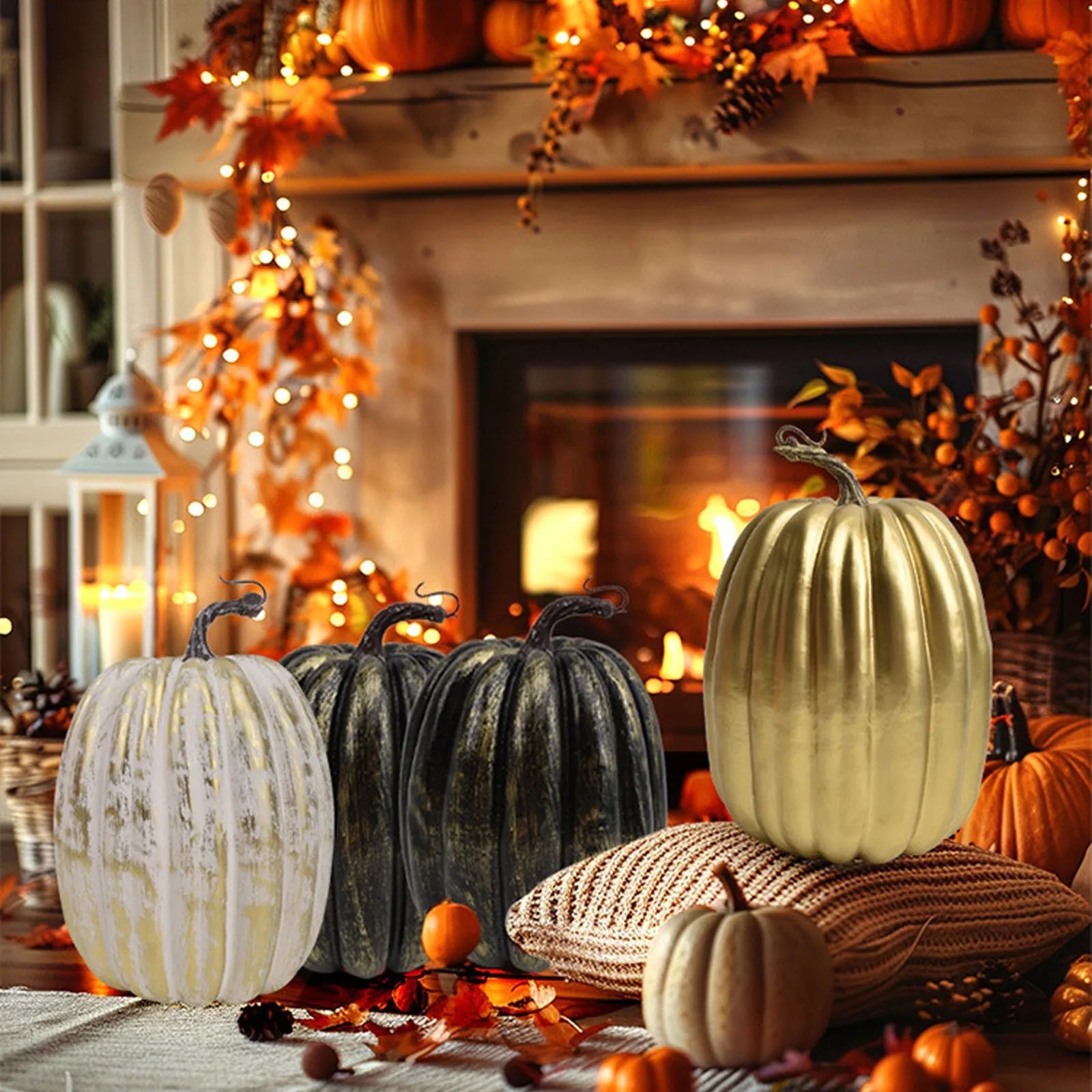 White, black, and gold artificial pumpkins arranged on a cozy living room table with fall decorations