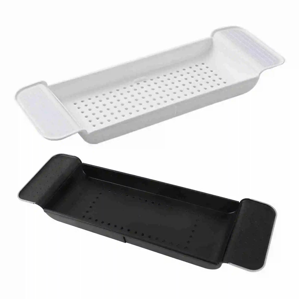 White and black versions of expandable bathtub tray with draining design displayed side by side