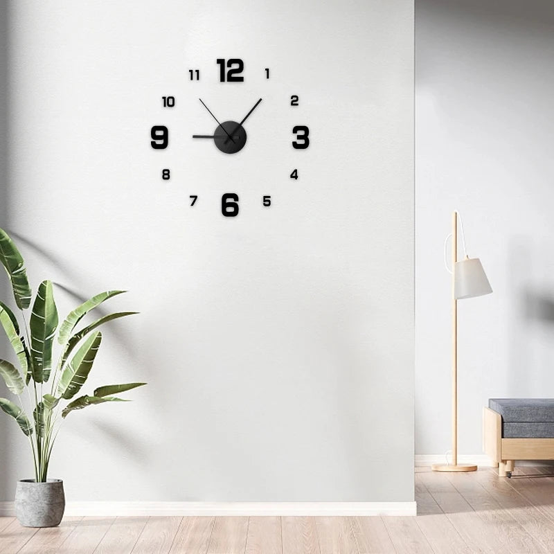 Black acrylic wall clock on a white wall in a modern living entry with plant and floor lamp