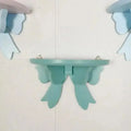 Ribbon Bow Wooden Wall Shelf for Kids’ Room – Pastel Decorative Display & Storage