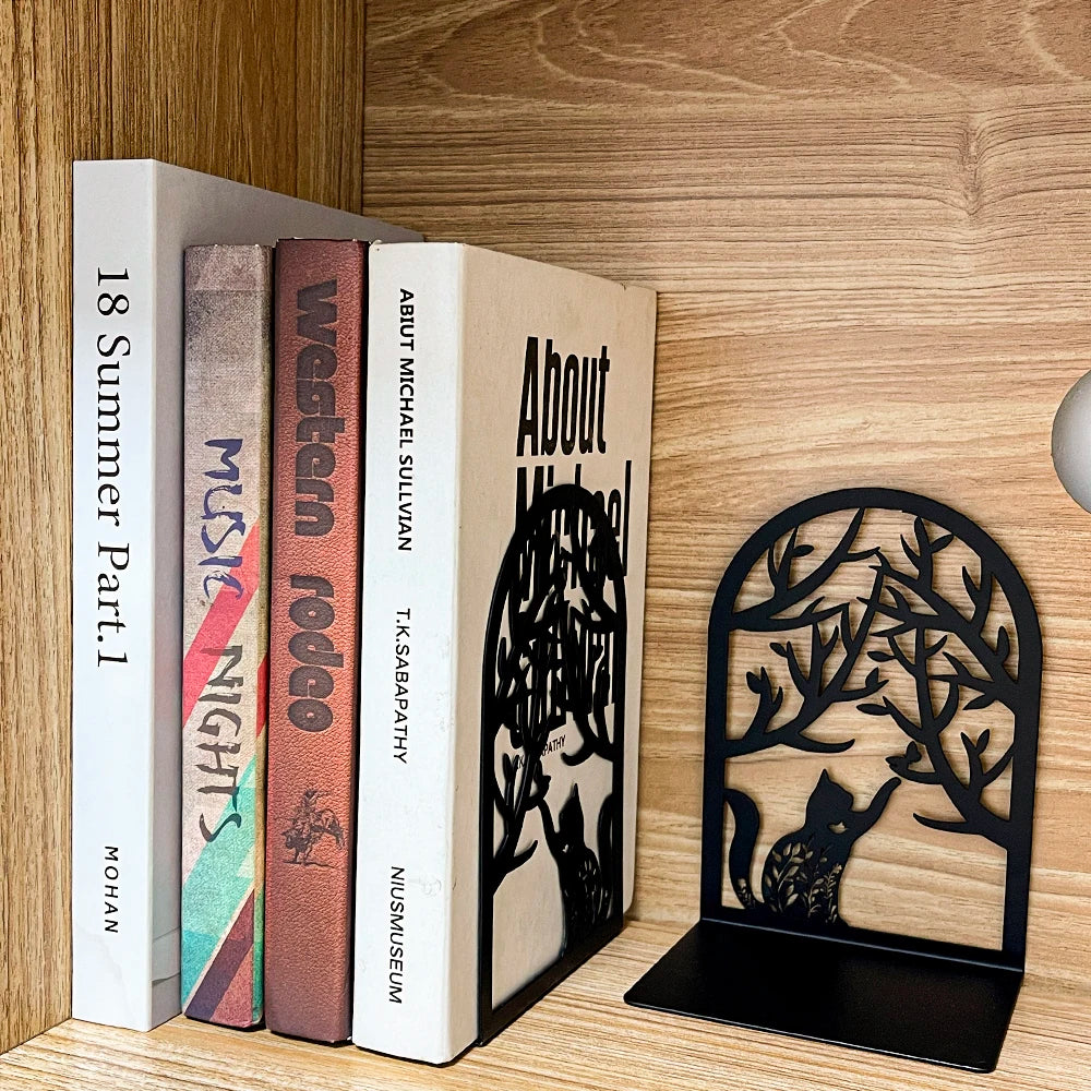Dog silhouette metal bookends supporting books on a shelf background
