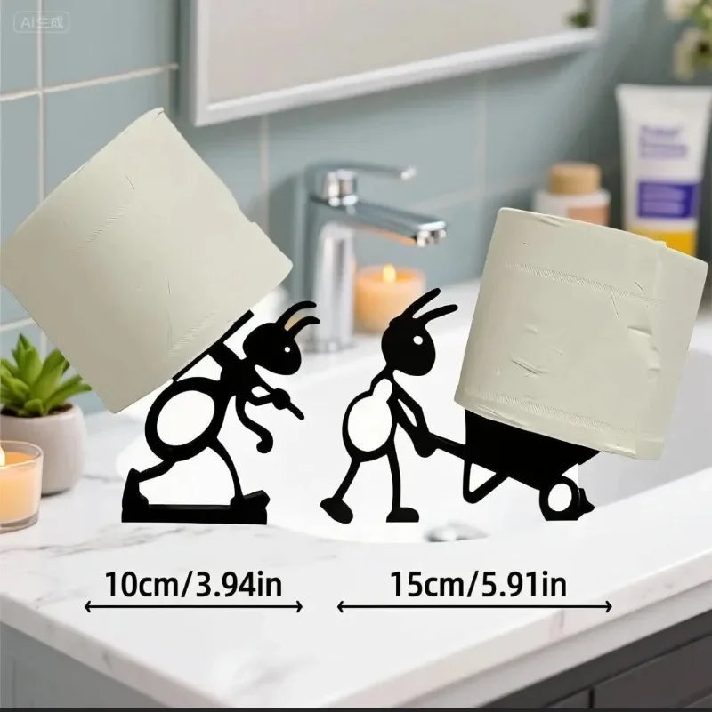 Ant tissue holders in use on a bathroom counter, each holding a roll of tissue with labeled dimensions shown.