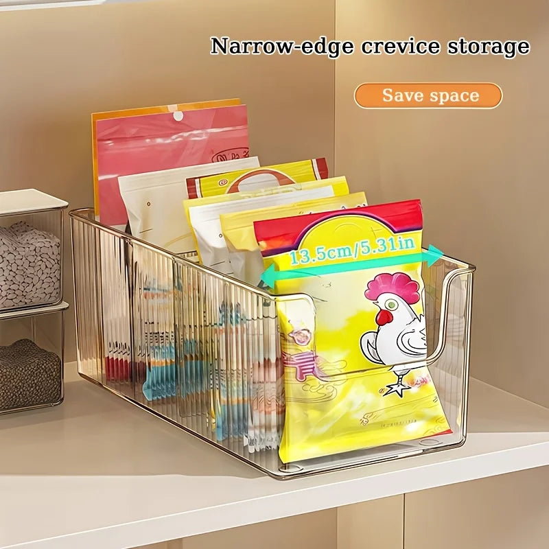 Narrow ribbed clear pantry storage box showing packaged snacks