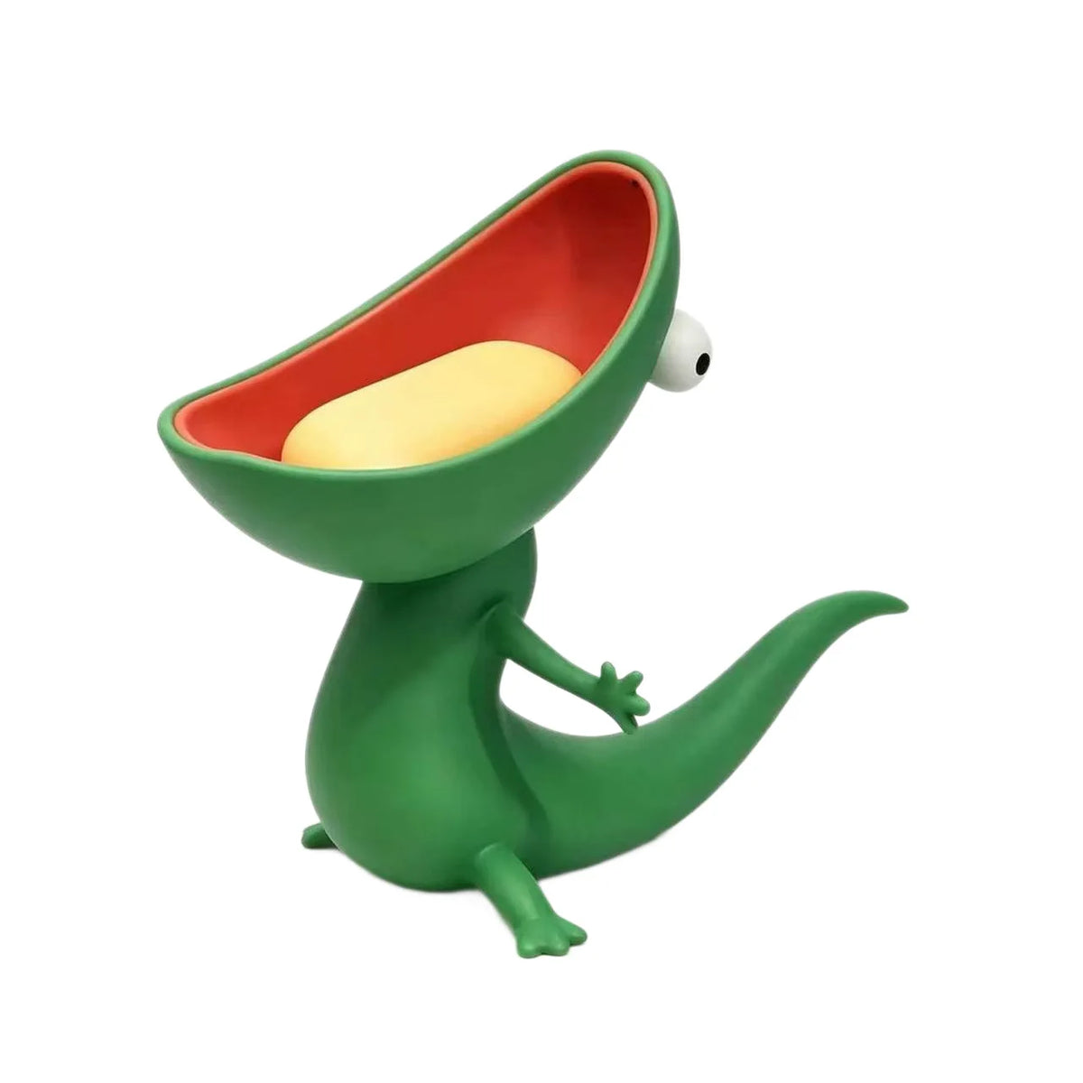 Closeup of green lizard soap dish holding a bar of soap against white background