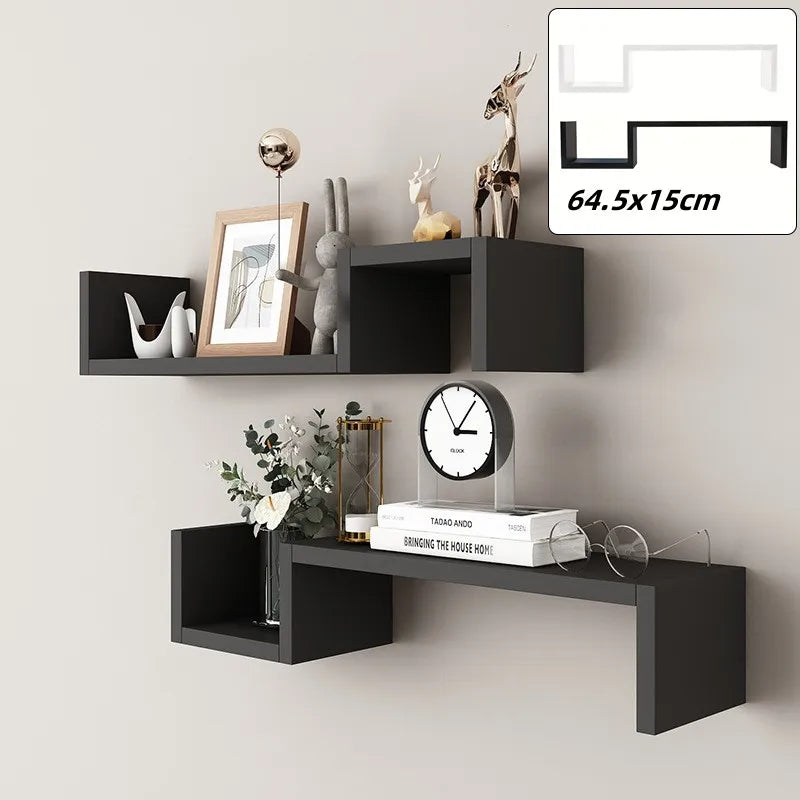 Black S-shaped floating wall shelves styled with books, decor, and a clock in a modern room, inset shows shelf dimensions and color options