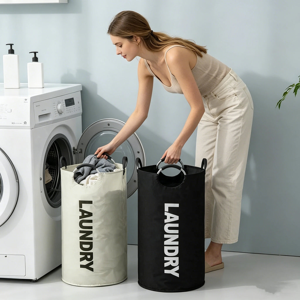 Woman using beige and black laundry baskets beside a front-load washing machine