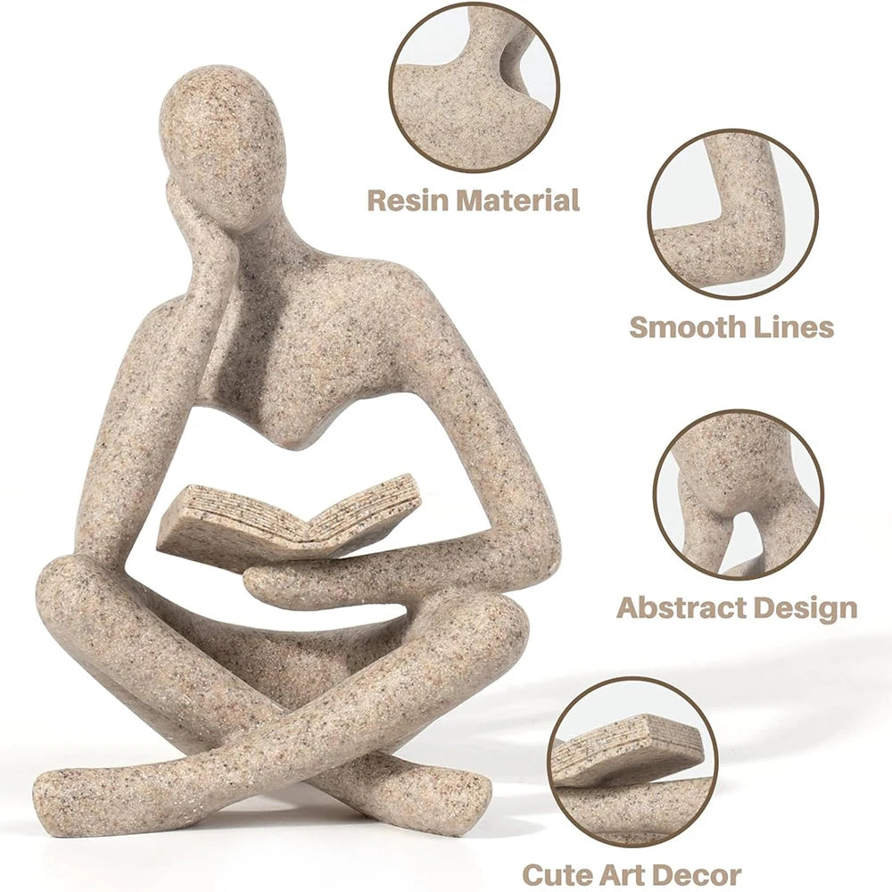 Abstract reader resin sculpture with details: resin material, smooth lines, abstract design, and book feature