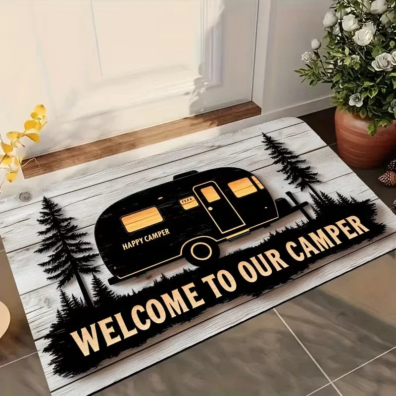 Rectangular RV welcome mat with camper print and 'Welcome to Our Camper' text at doorway