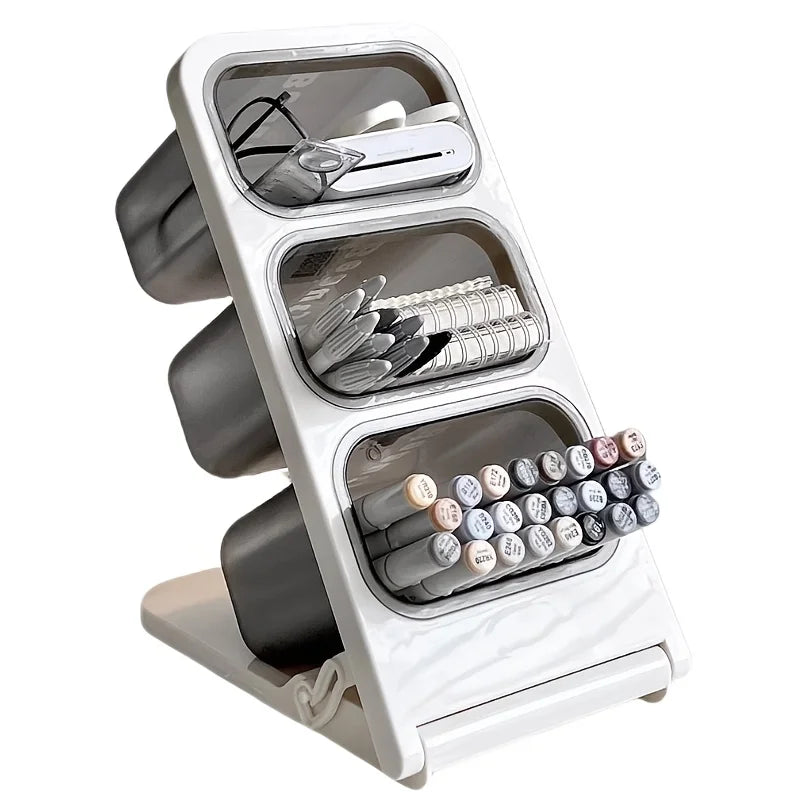 angled desk organizer with three compartments holding pens, markers, and notebooks