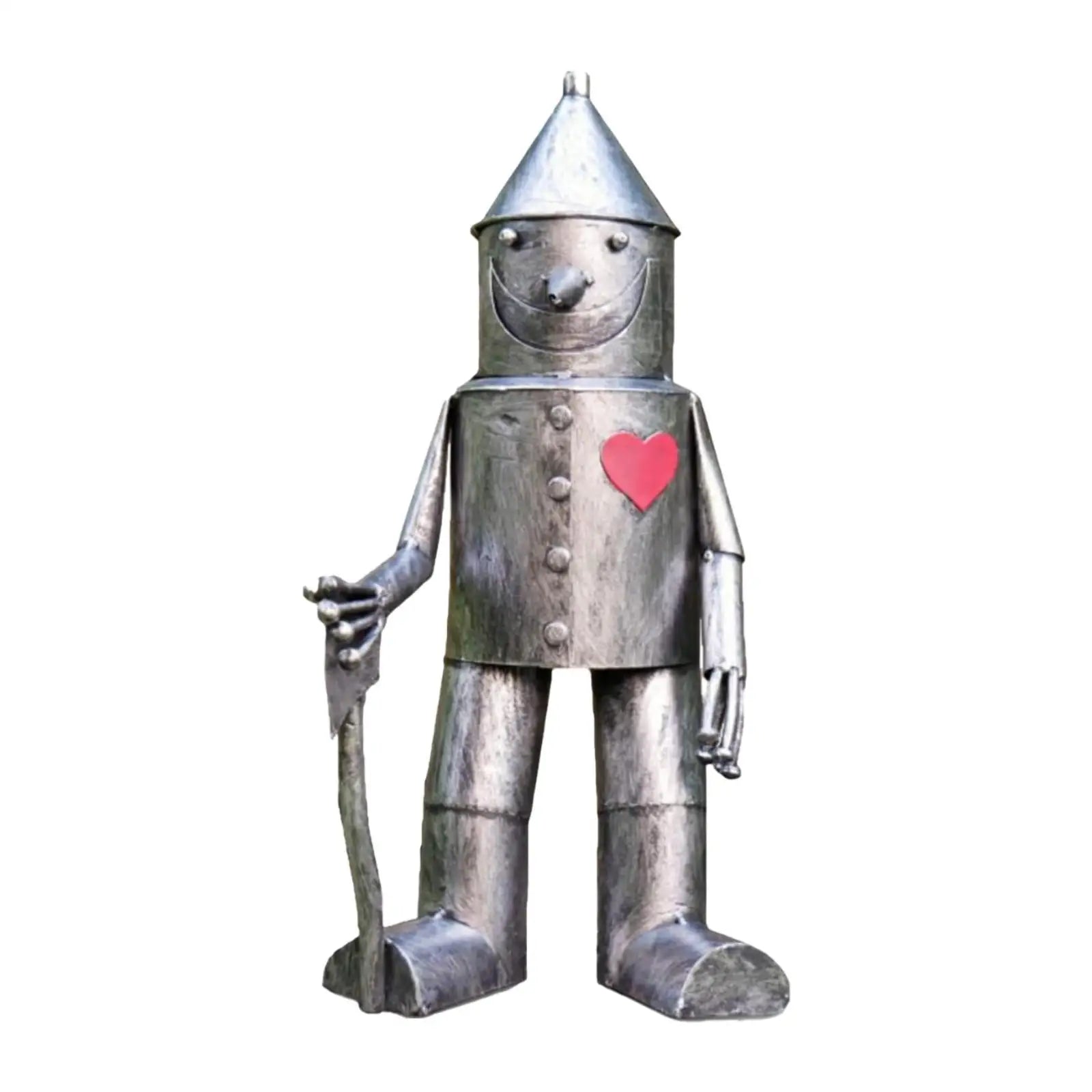 resin tin man garden statue with red heart accent on white background