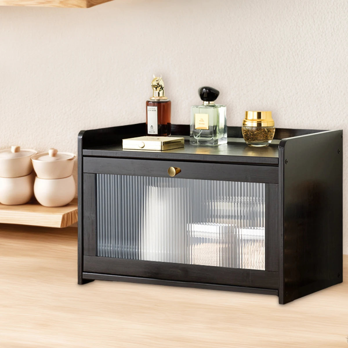 Black bamboo bread box used for storing small kitchen or vanity items