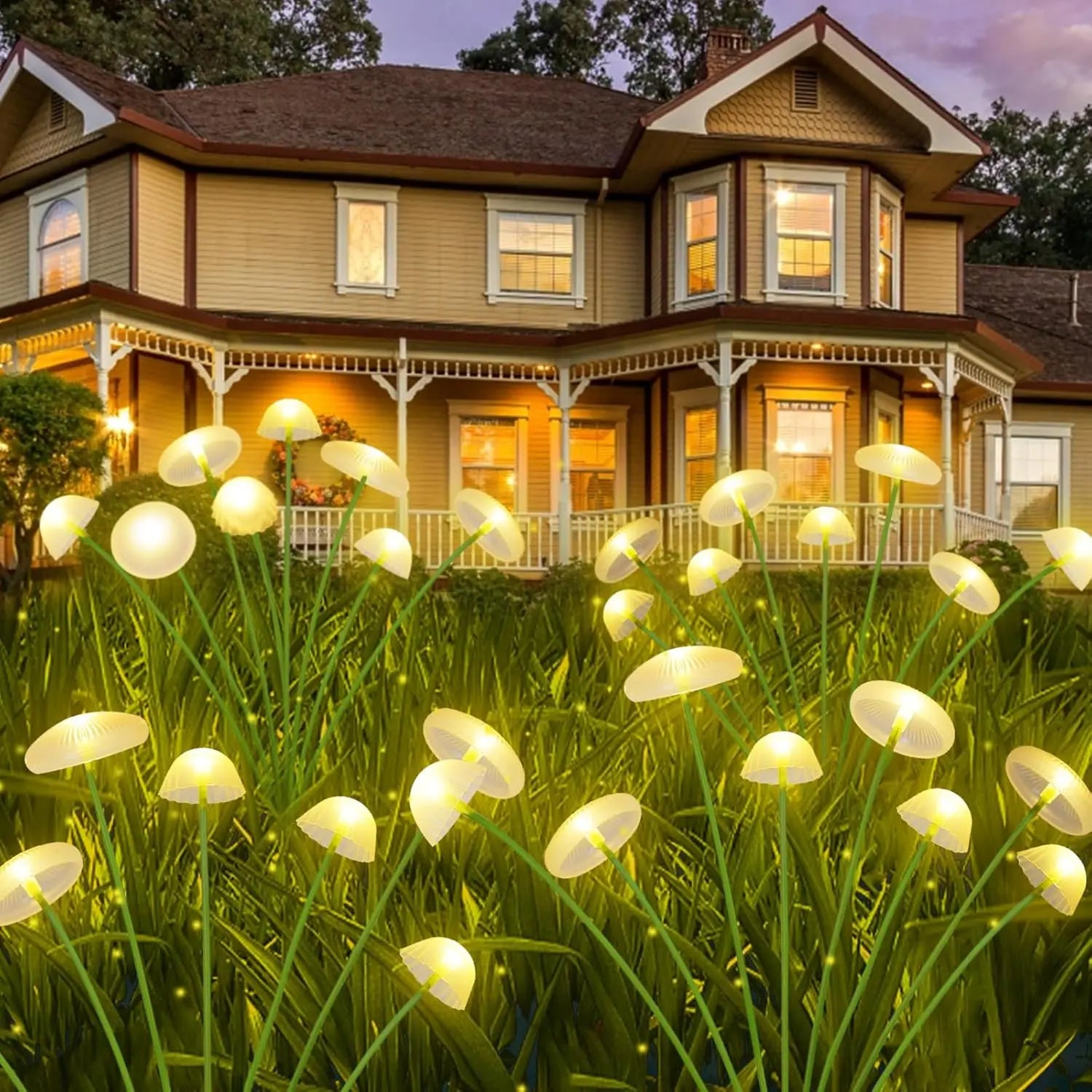 Warm white mushroom solar lights illuminating front yard garden at dusk