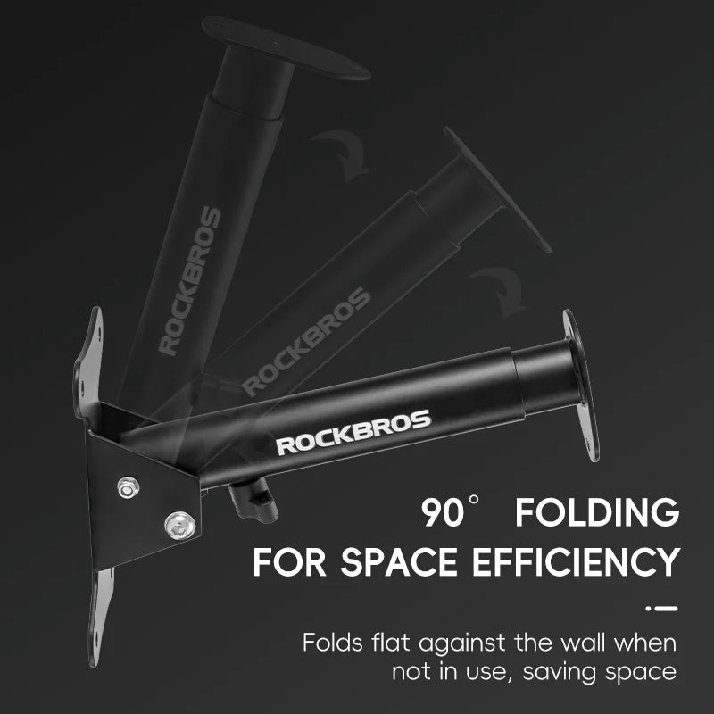 Wall-mounted bike rack arm shown folding flat against the wall for space-saving storage