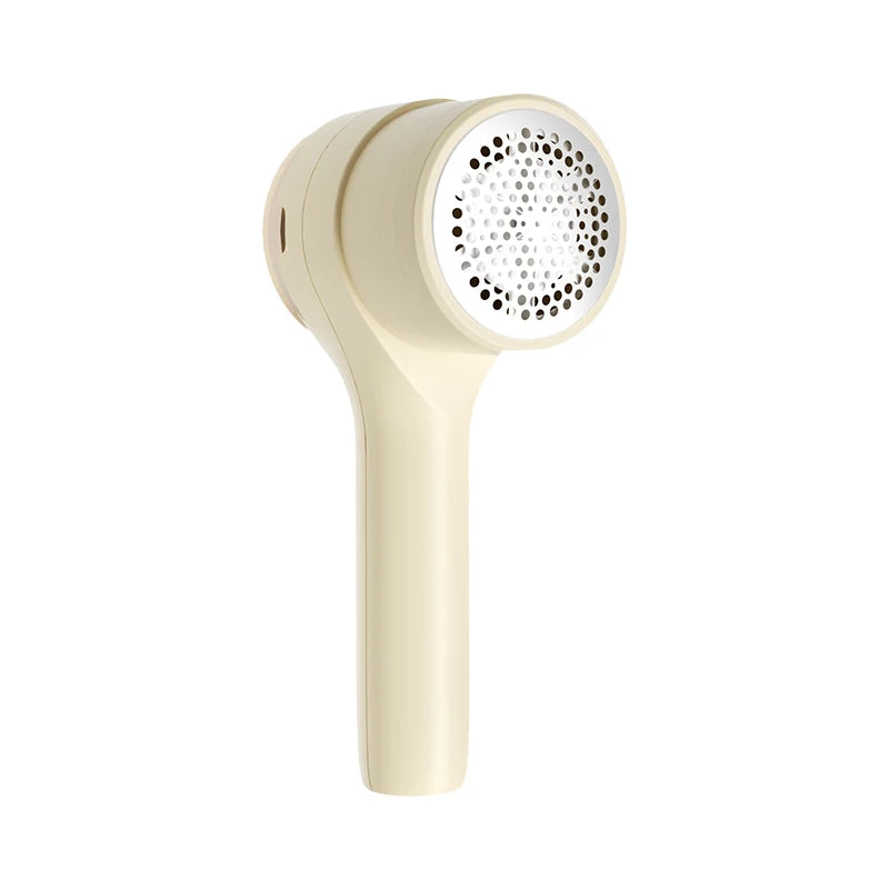 Standalone light yellow rechargeable fabric lint remover showing front mesh blade