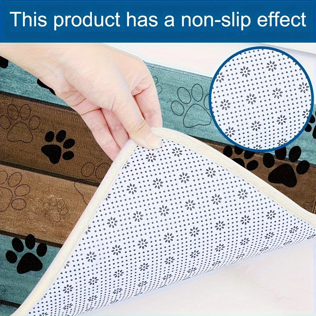Close-up showing non-slip dotted backing of paw print doormat being lifted by hand