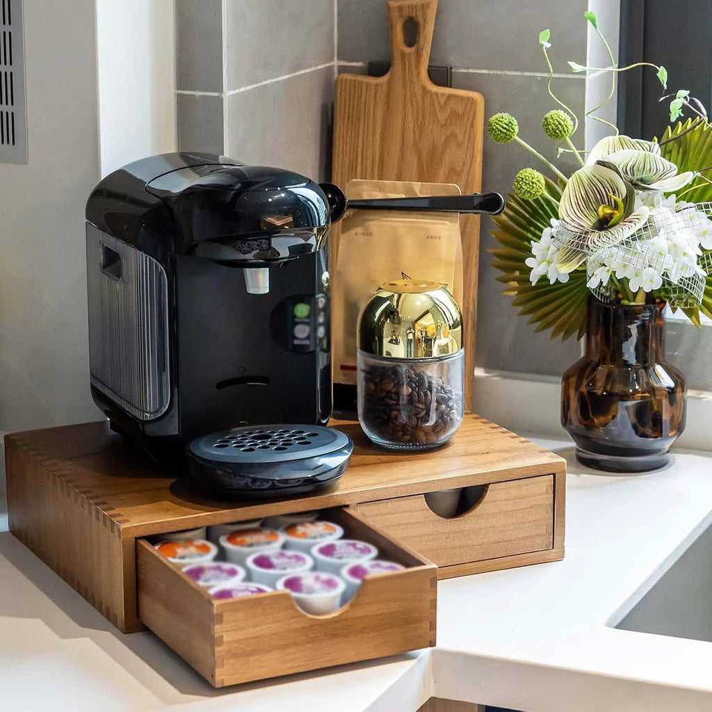 Coffee station setup with a coffee machine and coffee accessories on wooden organizer
