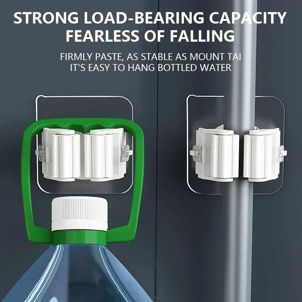 Adhesive wall mop holders supporting a mop and a hanging water bottle