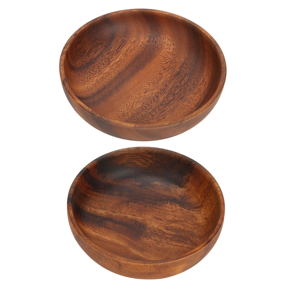 Pair of wood serving bowls showing unique grain pattern side by side