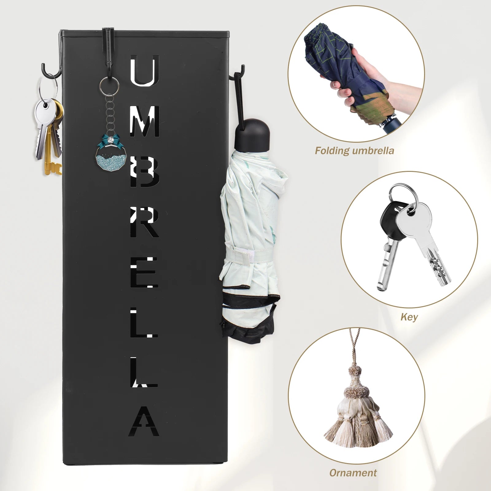 Side view of metal umbrella holder with cutout lettering, holding foldable umbrella and keys on removable hooks