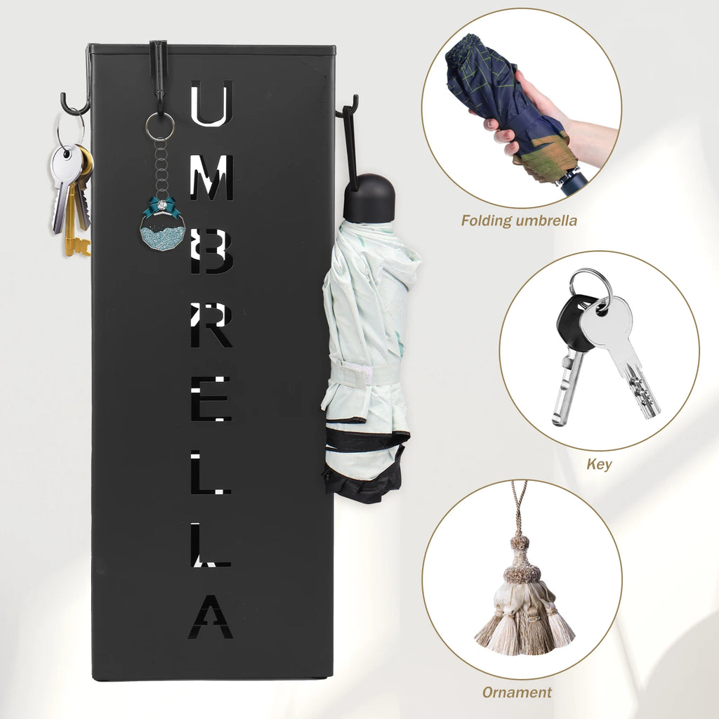 Side view of black metal umbrella stand with folding umbrella, keys, and ornament hanging from hooks