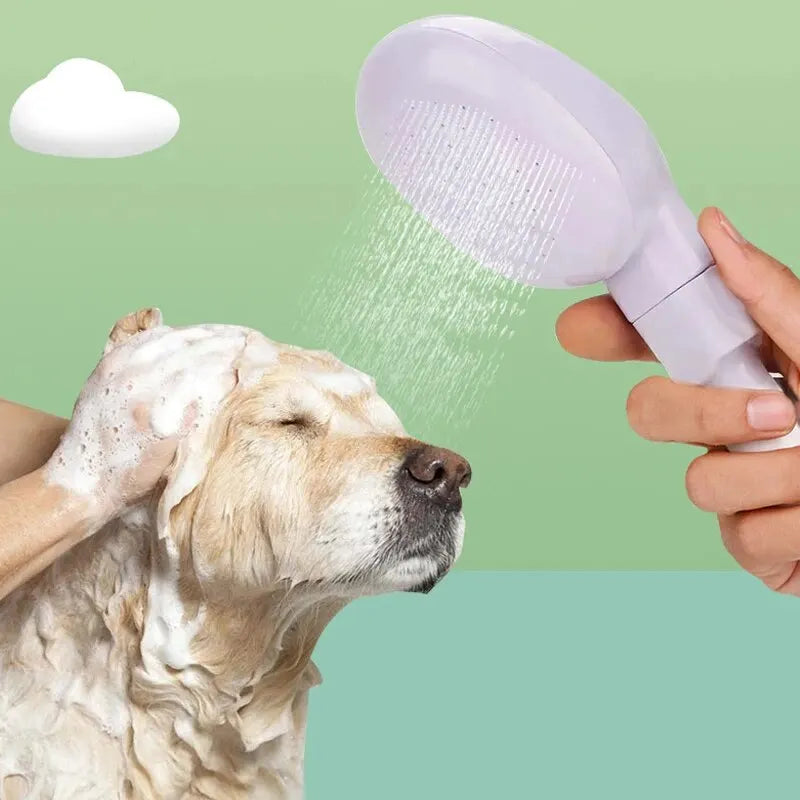 hand using sprayer to gently rinse soapy dog