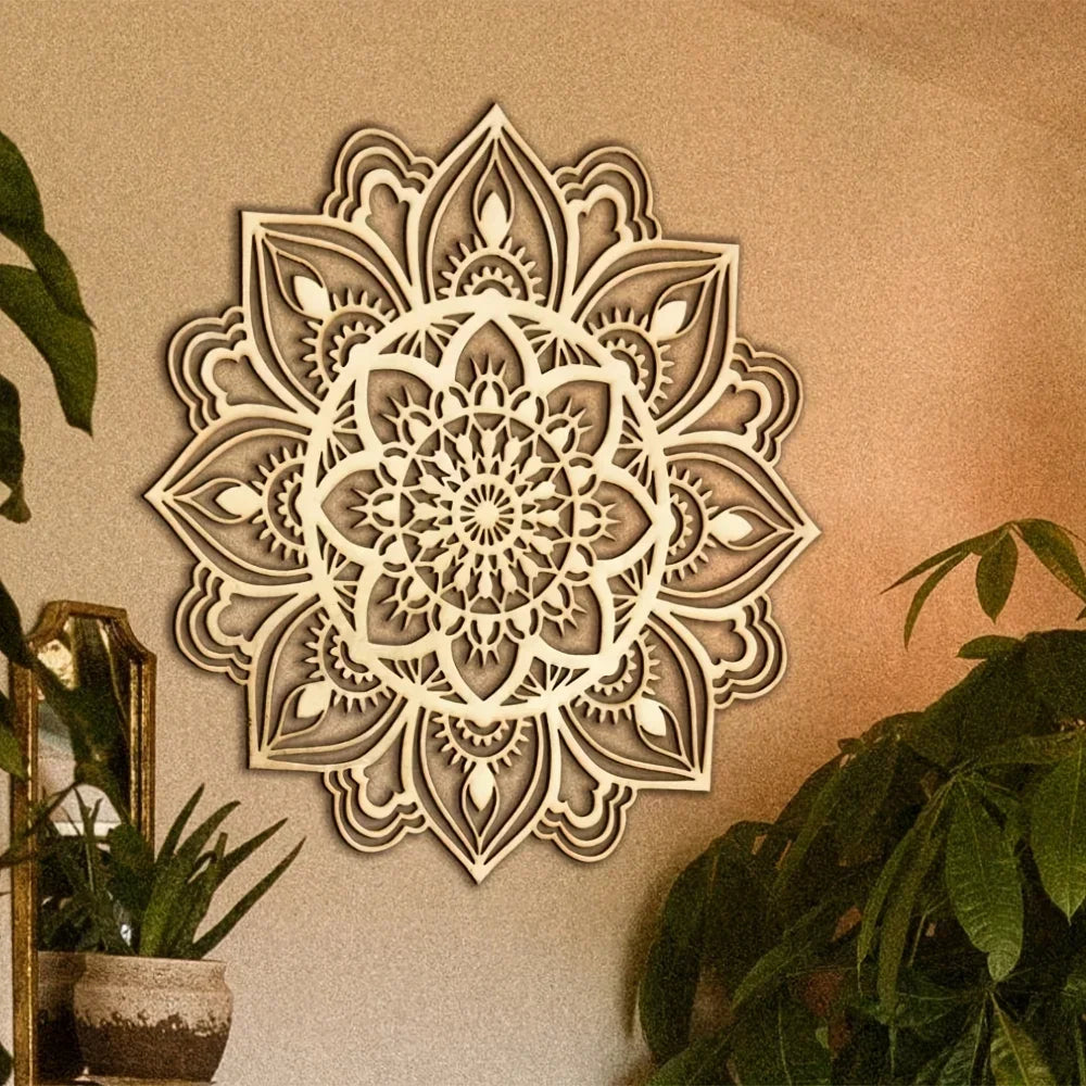 Moroccan-style cutout mandala metal wall art displayed above plants in a cozy living nook