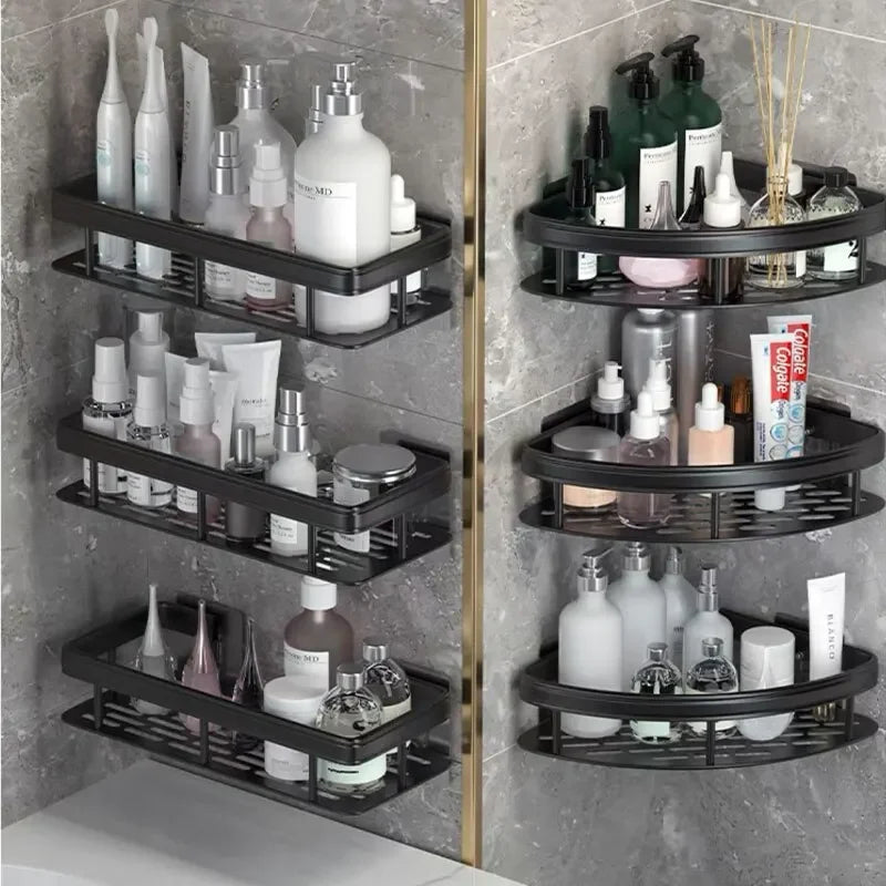 Black aluminum wall-mounted shelves, both corner and rectangle styles, organizing bath toiletries and skincare items in a modern bathroom.