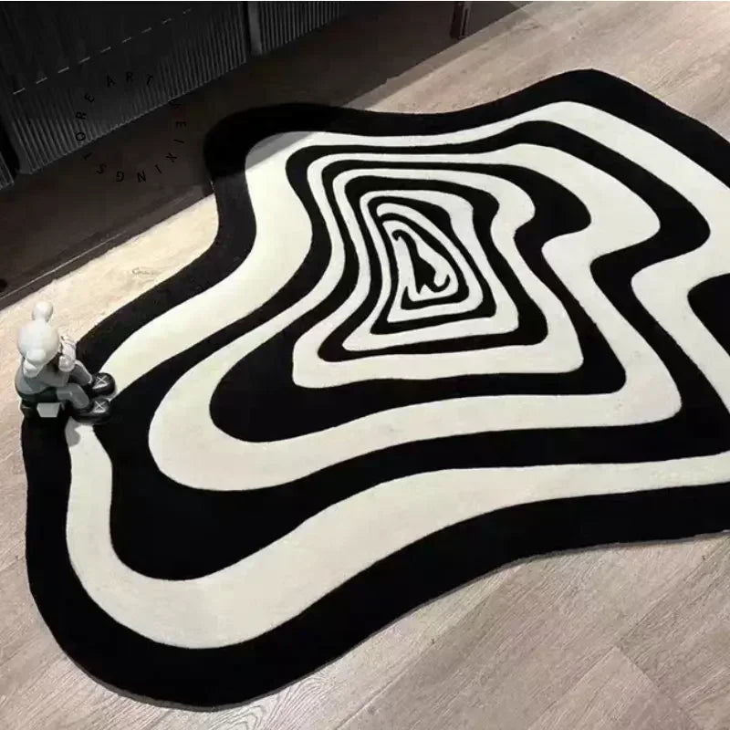 Close up of black and white geometric rug's unique flowing design