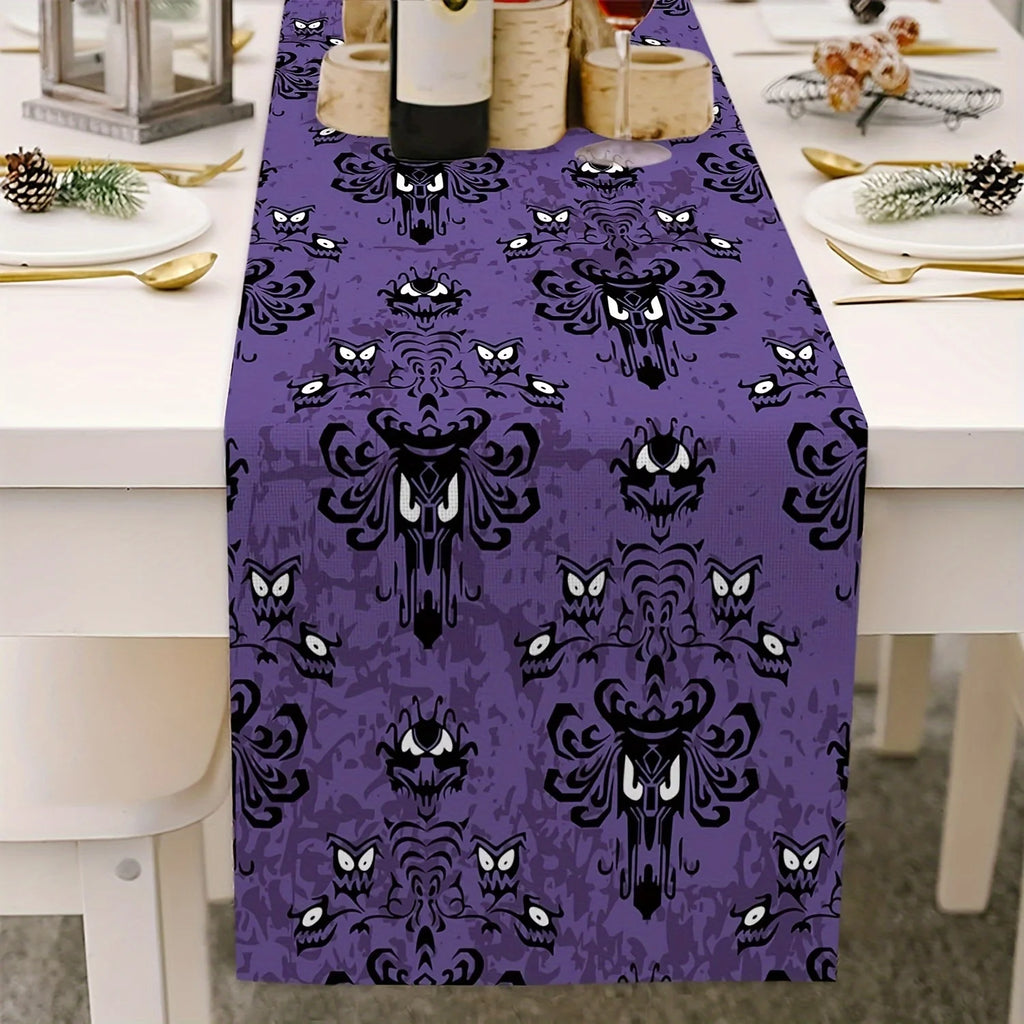 Purple haunted mansion ghost pattern table runner on festive holiday table with white dishes and candles