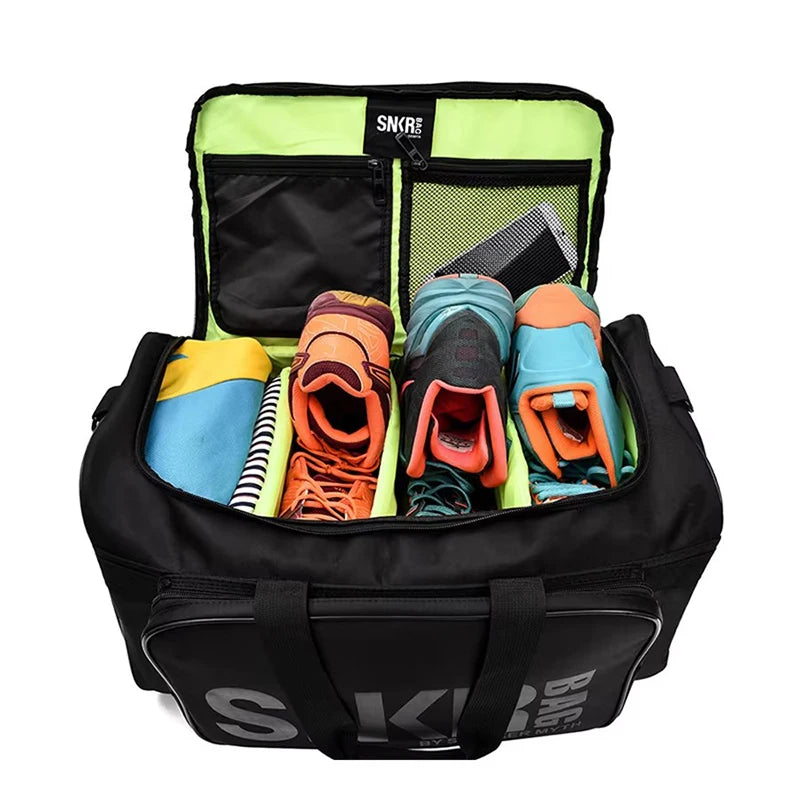 Open travel shoe organizer duffel bag with three pairs of sneakers and clothes neatly separated inside