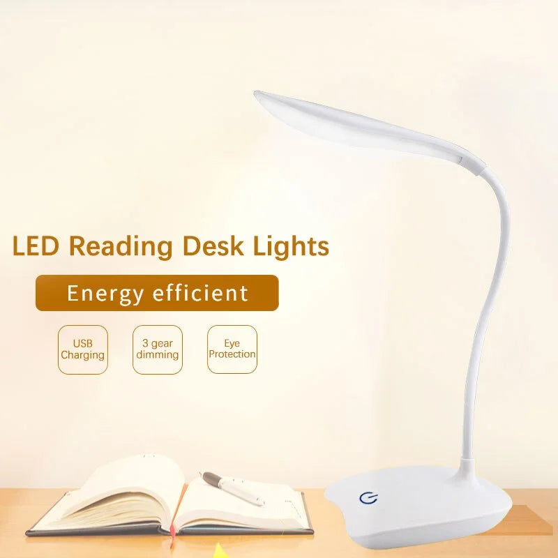 White LED desk lamp with flexible neck on a desk, shown with an open book and energy-efficient features