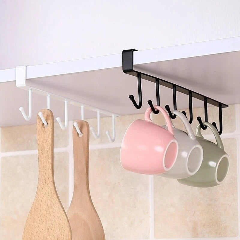 white and black under-shelf racks organizing mugs and utensils in a kitchen