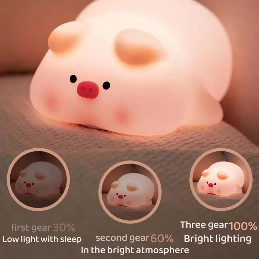 Dimmable piggy silicone night light showing brightness level options