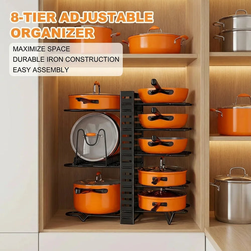 8-tier metal pot and pan rack with orange pots in a wooden kitchen cabinet