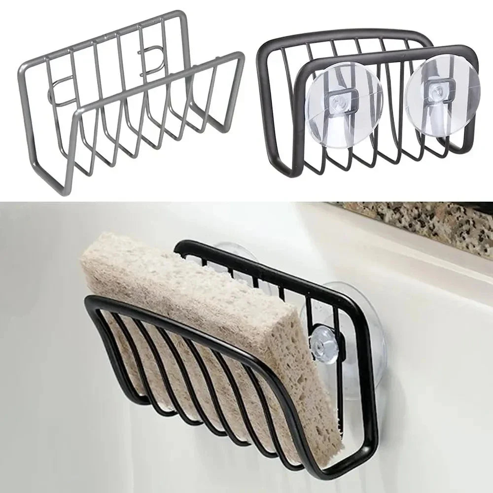 Black and silver stainless steel suction cup sponge holders shown empty and in use inside a kitchen sink