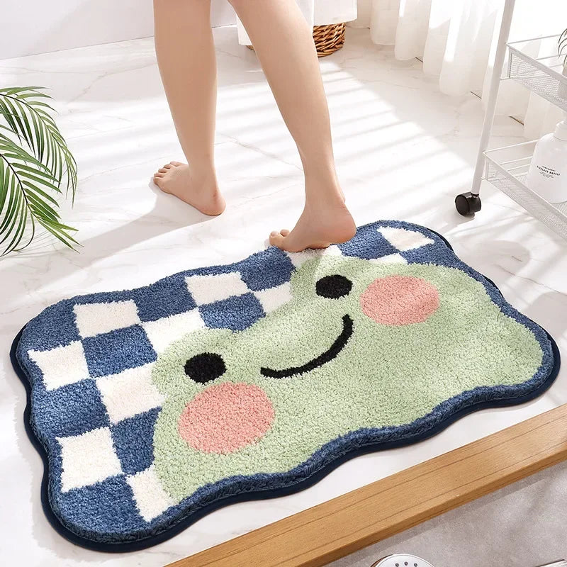 Blue checkered frog cartoon animal bath mat in a sunlit bathroom